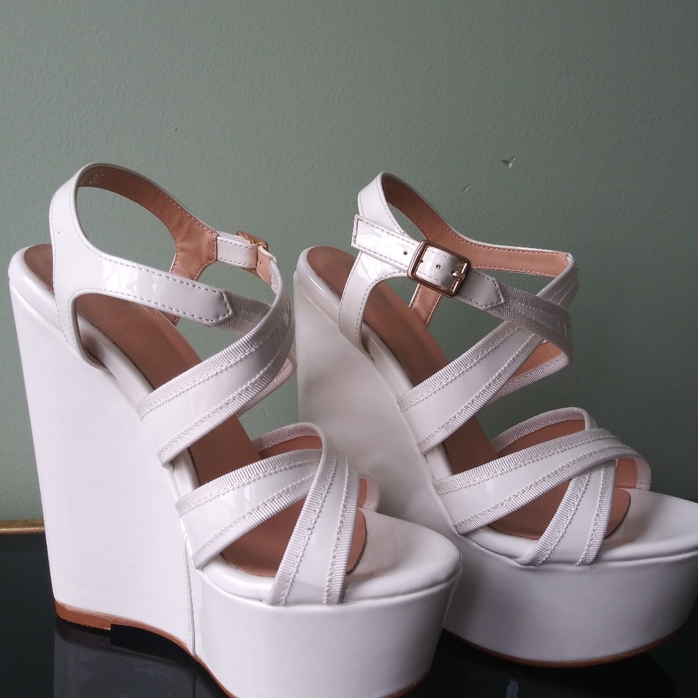 Gorgeous white strappy sandals.